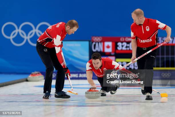 Geoff Walker, Brett Gallant and Mark Nichols of Team Canada compete against Team United States during the Men's Curling Bronze Medal Game on Day 14...