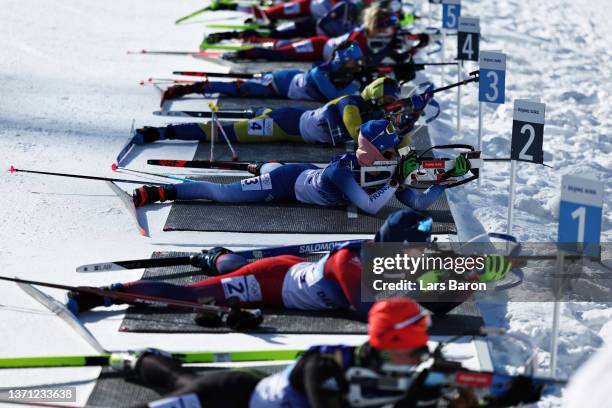 Anais Chevalier-Bouchet of Team France shoots during Women's Biathlon 12.5km Mass Start on day 14 of 2022 Beijing Winter Olympics at National...