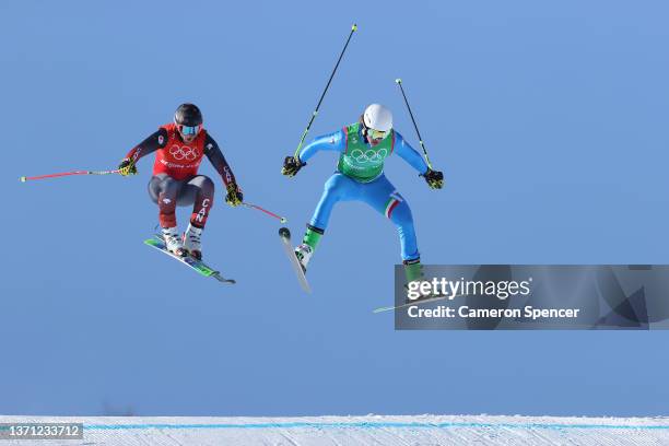 Brady Leman of Team Canada and Simone Deromedis of Team Italy competes during the Men's Ski Cross Small Final on Day 14 of the Beijing 2022 Winter...