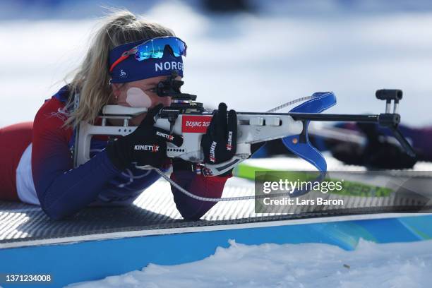 Tiril Eckhoff of Team Norway shoots during Women's Biathlon 12.5km Mass Start on day 14 of 2022 Beijing Winter Olympics at National Biathlon Centre...