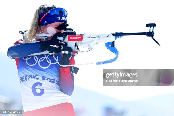 Tiril Eckhoff of Team Norway shoots during Women's Biathlon 12.5km Mass Start on day 14 of 2022 Beijing Winter Olympics at National Biathlon Centre...