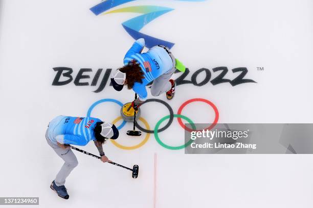 Christopher Plys and Matt Hamilton of Team United States compete against Team Canada during the Men's Curling Bronze Medal Game on Day 14 of the...