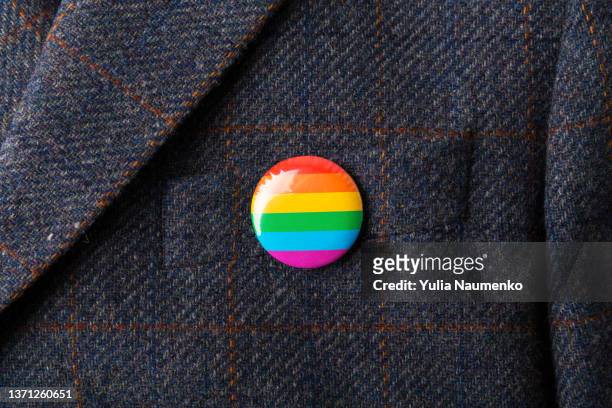 lgbtqia badge. concept of celebration of lgbtq pride flag day and people rights. - laura linney lights the empire state building in honor of red nose day stockfoto's en -beelden
