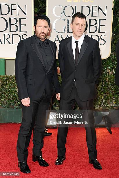 Composers Trent Reznor and Atticus Ross arrive at the 69th Annual Golden Globe Awards held at the Beverly Hilton Hotel on January 15, 2012 in Beverly...