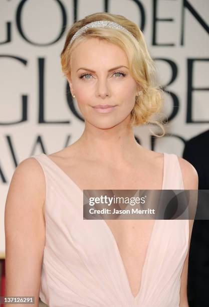 Actress Charlize Theron arrives at the 69th Annual Golden Globe Awards held at the Beverly Hilton Hotel on January 15, 2012 in Beverly Hills,...