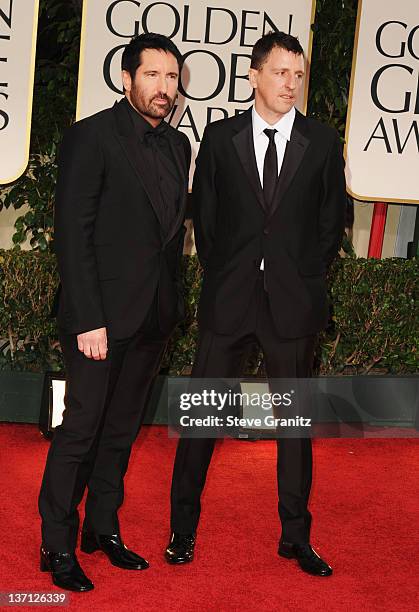 Composers Trent Reznor and Atticus Ross arrive at the 69th Annual Golden Globe Awards held at the Beverly Hilton Hotel on January 15, 2012 in Beverly...