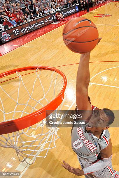 Jared Sullinger of the Ohio State Buckeyes slams home two of his 16 points against the Indiana Hoosiers on January 15, 2012 at Value City Arena in...