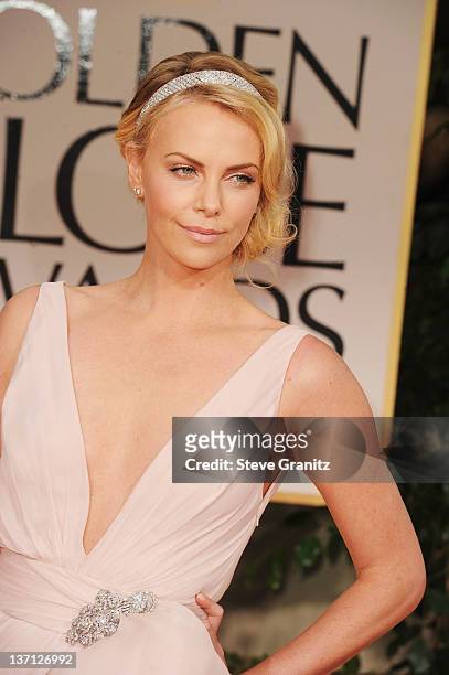 Actress Charlize Theron arrives at the 69th Annual Golden Globe Awards held at the Beverly Hilton Hotel on January 15, 2012 in Beverly Hills,...
