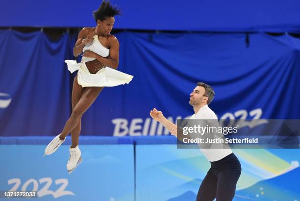 Vanessa James and Eric Radford of Team Canada skate during the Pair Skating Short Program on day fourteen of the Beijing 2022 Winter Olympic Games at...