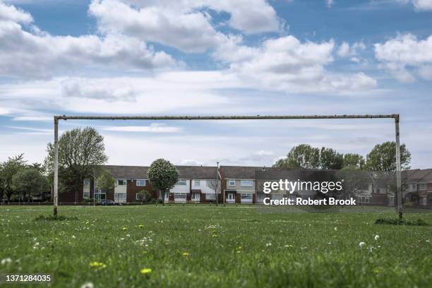 public playing field next to suburban houses - local soccer field stock pictures, royalty-free photos & images