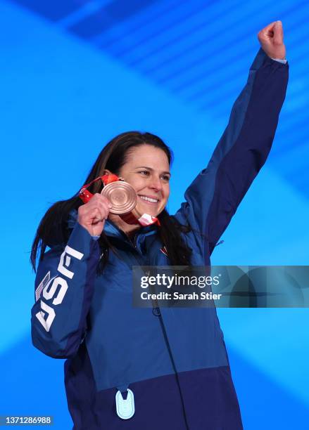 Bronze Medallist Brittany Bowe of Team United States poses with their medal during the Women's 1000m Medal Ceremony on Day 14 of the Beijing 2022...