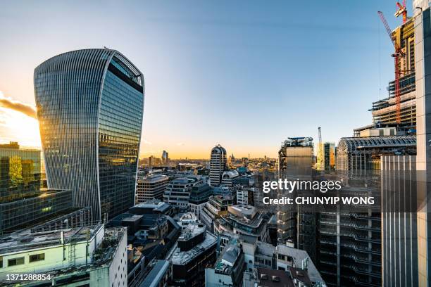 aerial view of 20 fenchurch street or walkie talkie building in london - london swiss re stock pictures, royalty-free photos & images