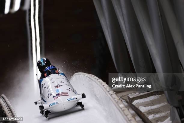 Kaillie Humphries and Kaysha Love of Team United States slide during the 2-women Bobsleigh heats on day 14 of Beijing 2022 Winter Olympic Games at...