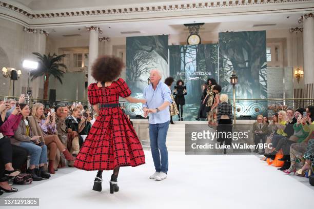 Designer Paul Costelloe walks the runway at the Paul Costelloe show during London Fashion Week February 2022 on February 18, 2022 in London, England.