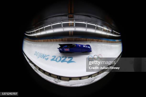 Mica Mcneill and Montell Douglas of Team Great Britain slide during the 2-women Bobsleigh heats on day 14 of Beijing 2022 Winter Olympic Games at...