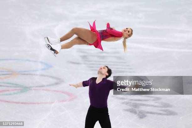 Kirsten Moore-Towers and Michael Marinaro of Team Canada skate during the Pair Skating Short Program on day fourteen of the Beijing 2022 Winter...
