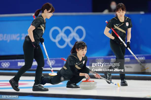 Yurika Yoshida, Chinami Yoshida and Yumi Suzuki of Team Japan compete against Team Switzerland during the Women's Semi-Final on Day 14 of the Beijing...