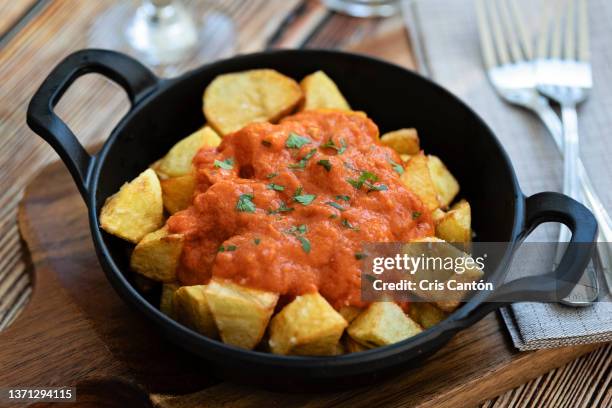 patatas bravas - patatas bravas stock pictures, royalty-free photos & images