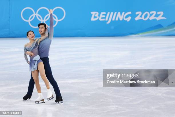 Cheng Peng and Yang Jin of Team China react after skating during the Pair Skating Short Program on day fourteen of the Beijing 2022 Winter Olympic...
