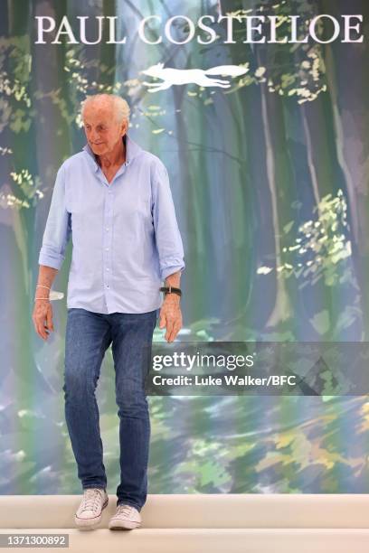 Designer Paul Costelloe walks the runway at the Paul Costelloe show during London Fashion Week February 2022 on February 18, 2022 in London, England.