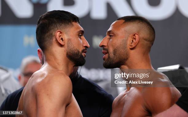 Amir Khan and Kell Brook go head to head during the official weigh-in at Manchester Central Convention Complex on February 18, 2022 in Manchester,...