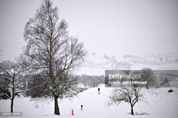 Sledgers make the moist of the snowy conditions on Gleneagles Golf Course on February 18, 2022 in Auchterarder, Scotland. The Met Office has issued...