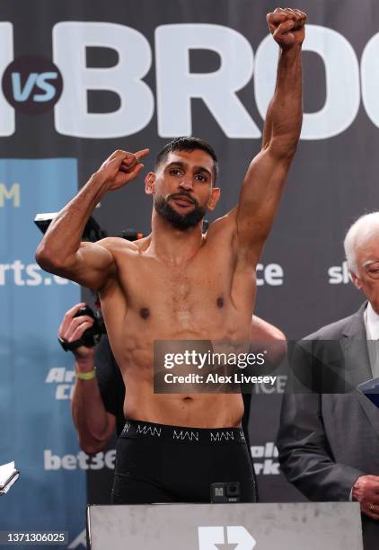 Amir Khan stands on the scales during the official weigh-in at Manchester Central Convention Complex ahead of his fight against Kell Brook on...