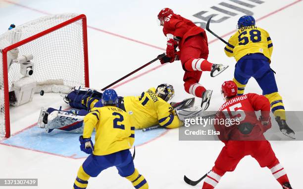Anton Slepyshev of Team ROC scores a goal in the second period during the Men's Ice Hockey Playoff Semifinal match between Team ROC and Team Sweden...