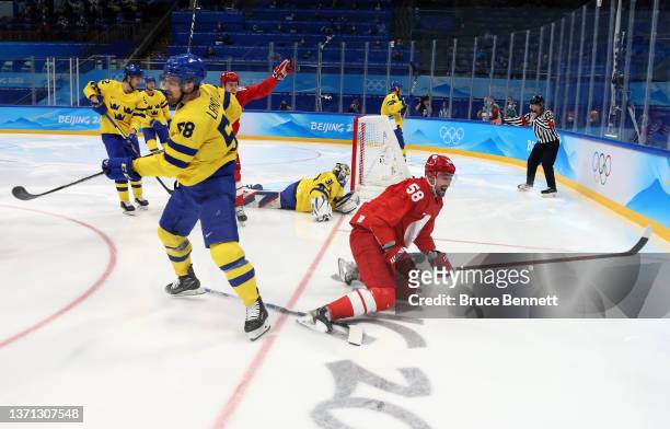 Anton Slepyshev of Team ROC celebrates after scoring a goal in the second period during the Men's Ice Hockey Playoff Semifinal match between Team ROC...