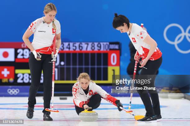 Melanie Barbezat, Silvana Tirinzoni and Esther Neuenschwander of Team Switzerland compete against Team Japan during the Women's Semi-Final on Day 14...
