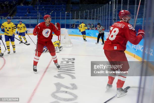 Anton Slepyshev of Team ROC celebrates after scoring a goal in the second period during the Men's Ice Hockey Playoff Semifinal match between Team ROC...