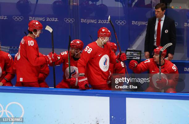 Anton Slepyshev of Team ROC celebrates goal with team in the second period during the Men's Ice Hockey Playoff Semifinal match between Team ROC and...