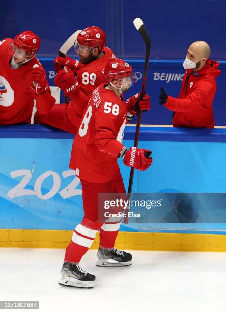 Anton Slepyshev of Team ROC celebrates goal with team in the second period during the Men's Ice Hockey Playoff Semifinal match between Team ROC and...