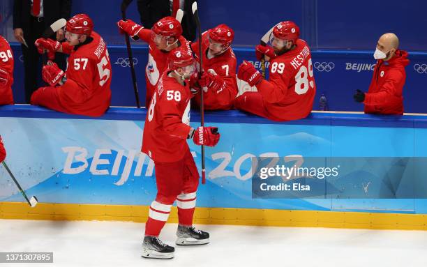 Anton Slepyshev of Team ROC celebrates goal with team in the second period during the Men's Ice Hockey Playoff Semifinal match between Team ROC and...