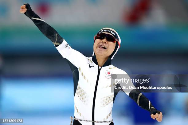 Miho Takagi of Team Japan celebrates after skating to set a new Olympic record time of 1:13.19 during the Women's 1000m on day thirteen of the...