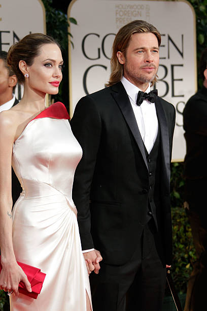Actors Angelina Jolie and Brad Pitt arrive at the 69th Annual Golden Globe Awards held at the Beverly Hilton Hotel on January 15, 2012 in Beverly...