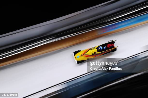 Laura Nolte and Deborah Levi of Team Germany slide during the 2-women Bobsleigh heats on day 14 of Beijing 2022 Winter Olympic Games at National...