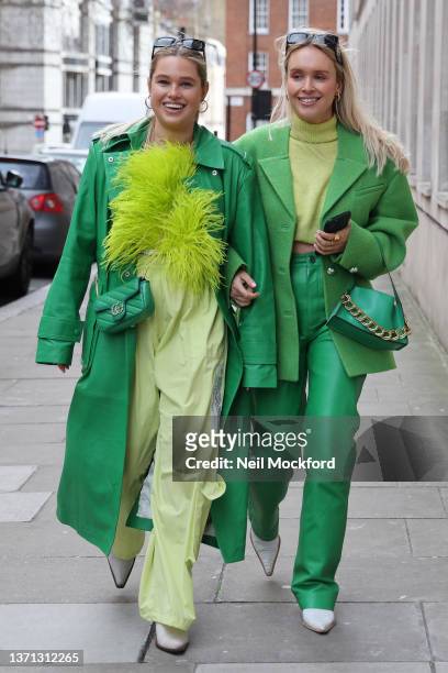 Guests wearing green coats, green handbags attends Poster Girl show at 1 Harewood Avenue during London Fashion Week February 2022 on February 18,...