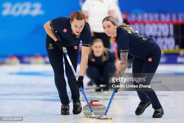 Agnes Knochenhauer and Sofia Mabergs of Team Sweden compete against Team Great Britain during the Women's Semi-Final on Day 14 of the Beijing 2022...