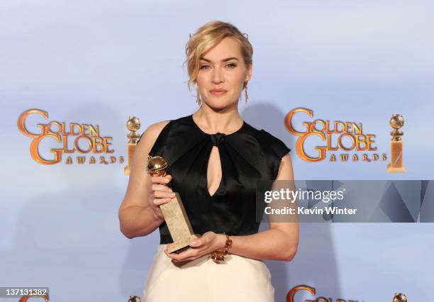 Actress Kate Winslet poses in the press room with the Best Performance by an Actress in a Mini-Series or a Motion Picture Made for Television award...