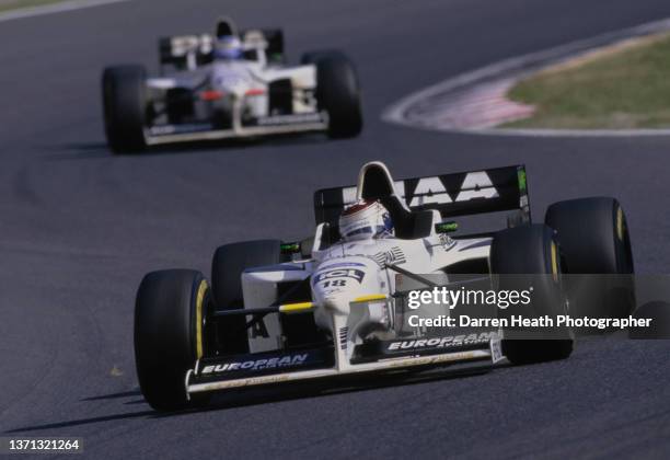 Jos Verstappen of the Netherlands drives the PIAA Tyrrell Tyrrell 025 Ford V8 ahead of team mate Mika Salo during the Formula One Grand Prix of Japan...