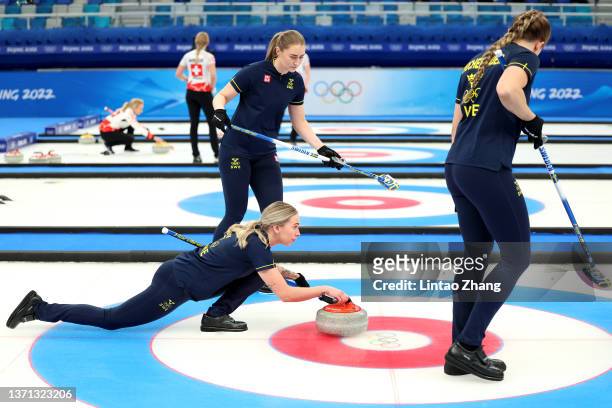 Sara McManus, Sofia Mabergs and Agnes Knochenhauer of Team Sweden compete against Team Great Britain during the Women's Semi-Final on Day 14 of the...