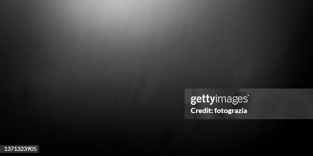 black textured background - grey gradient stock pictures, royalty-free photos & images