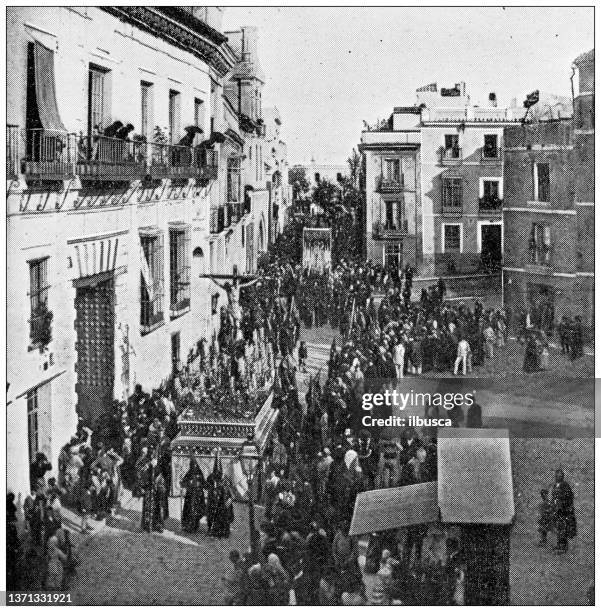 antique travel photographs of spain: seville religious procession - holy week stock illustrations