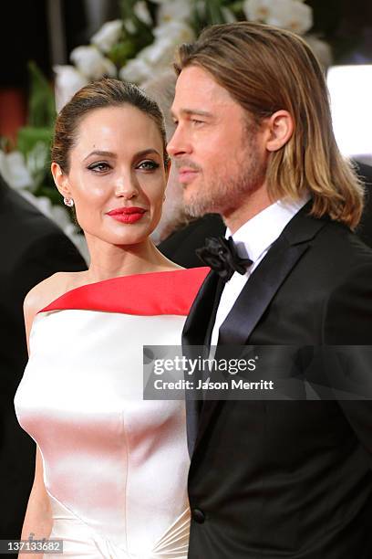 Actress Angelina Jolie and actor Brad Pitt arrive at the 69th Annual Golden Globe Awards held at the Beverly Hilton Hotel on January 15, 2012 in...