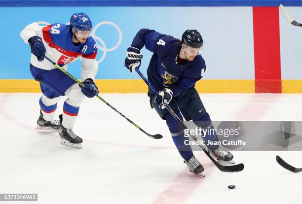 Mikko Lehtonen of Finland, Peter Cehlarik of Slovakia during the Men's Ice Hockey Playoff Semifinal match between Team Finland and Team Slovakia on...
