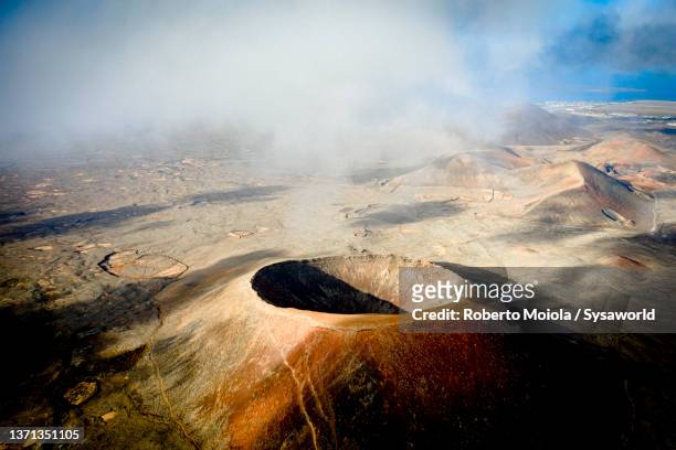 aerial view of smoke out of hondo volcano, fuerteventura - fuerteventura bildbanksfoton och bilder