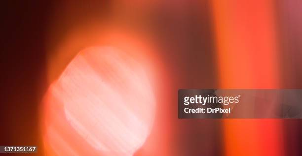 old film defocused background with light leak - burnt film stock pictures, royalty-free photos & images