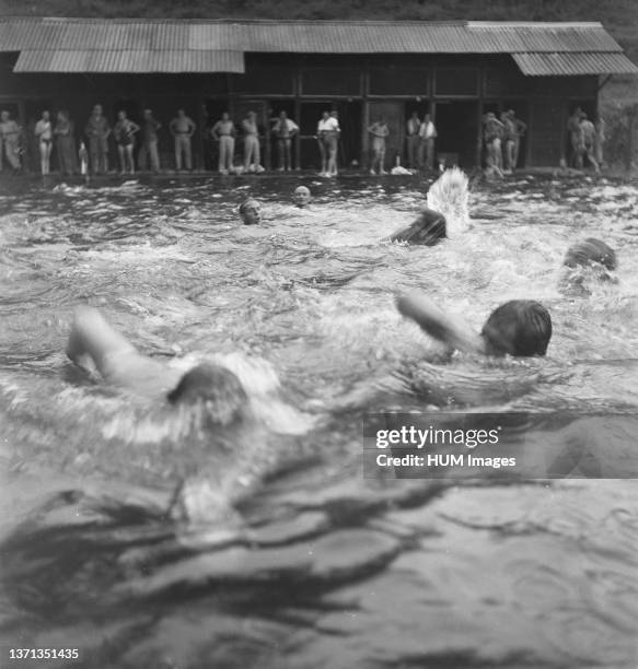 Soldiers in swimming pool - Location: Indonesia, Dutch East Indies.