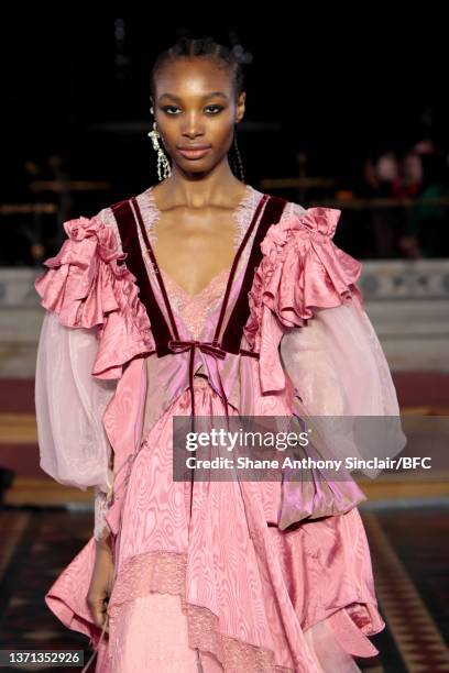 Model walks the runway at the Bora Aksu show during London Fashion Week February 2022 on February 18, 2022 in London, England.